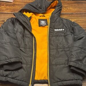 Timberland Black Jacket with Bold Orange Interior